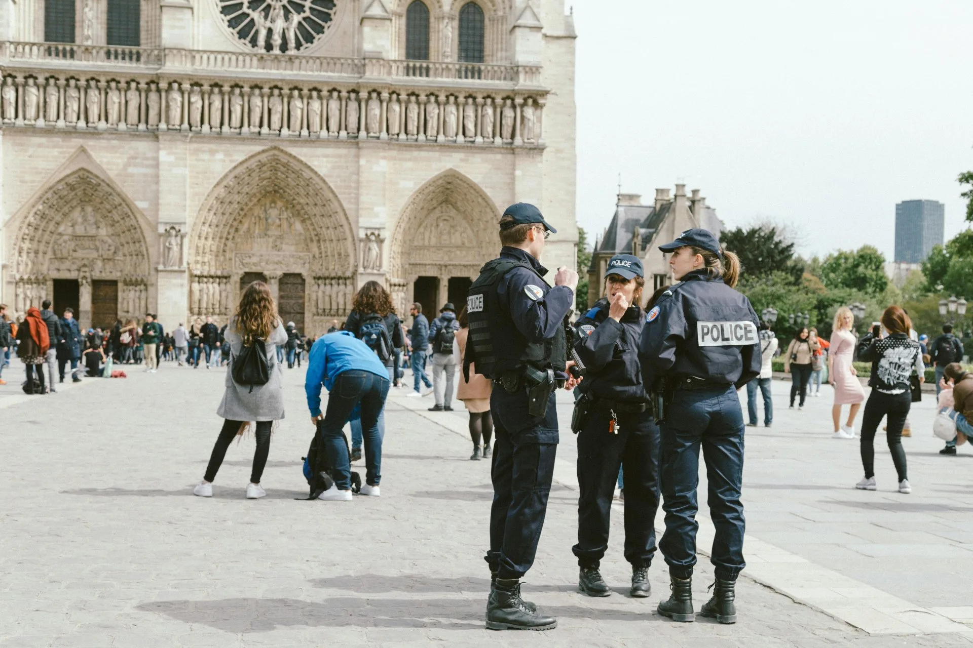 Police in front of Notre Dame de Paris by Tranmautritam
