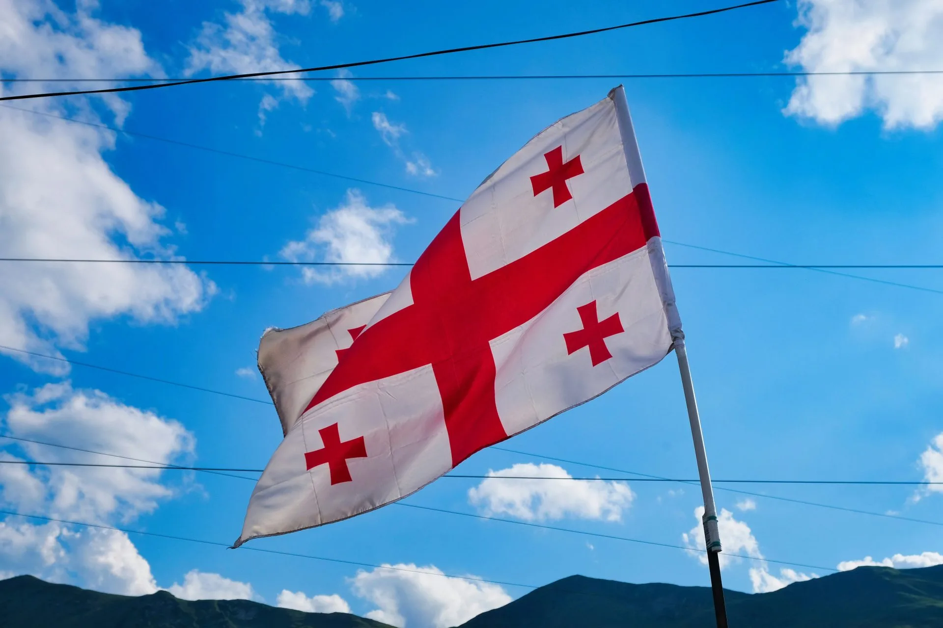 Georgian flag waving in the sky