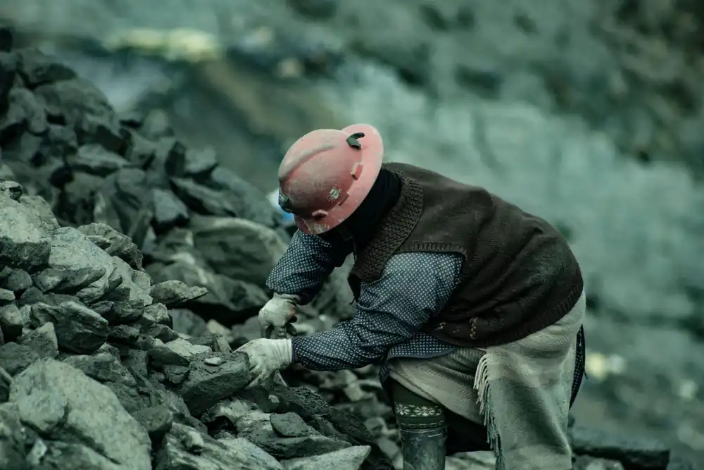 Open-pit miner collecting metal